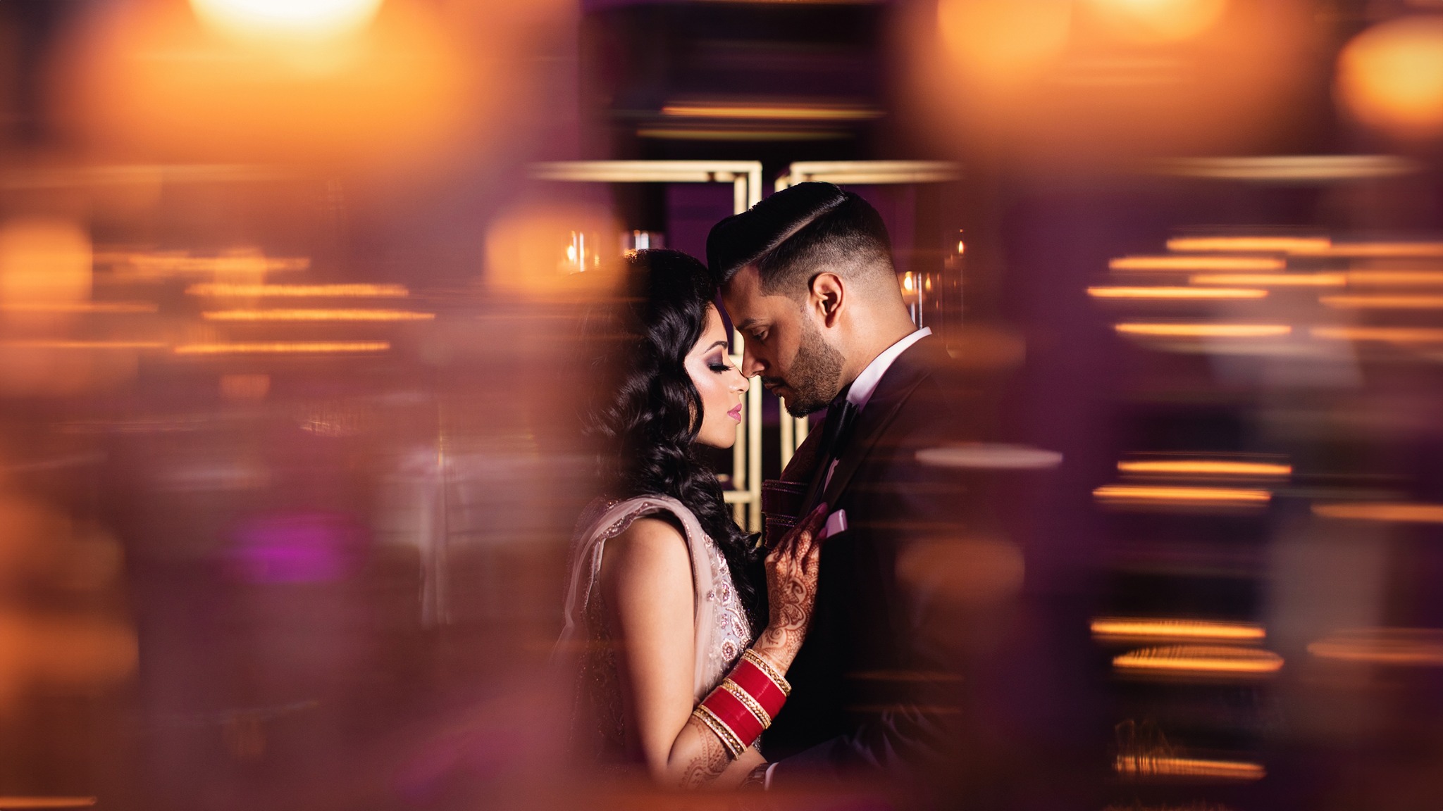 South Asian couple sharing an emotional first look on their wedding day